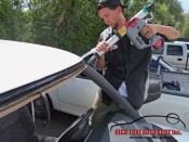 setting adhesive to the windshield frame